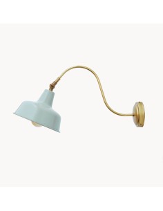 wall light with aged brass finish and light blue shade