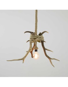 vintage ceiling lamp is made of three deer antlers