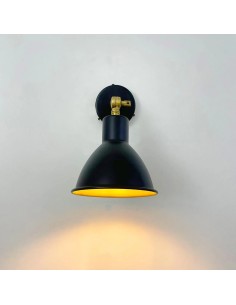 vintage wall light with artisanal materials and finishes