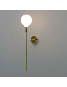 indoor wall lamp with a simple and stylized design made of metal with a brass effect