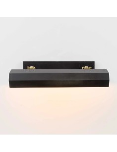 Made of metal with a textured black or brass effect finish and gold details 2