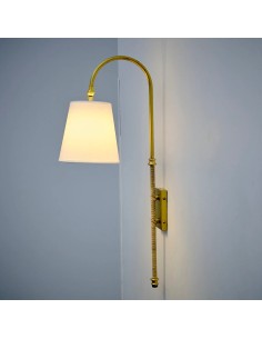 vintage wall light with a small conical lampshade of white chims fabric made by hand.