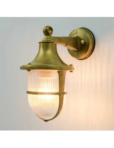 vintage wall light made of cast brass in navy-mariné style