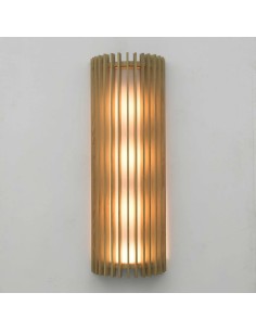 wall sconces formed by a cylindrical white cotton lampshade