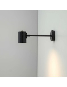 wall light in slightly aged black color