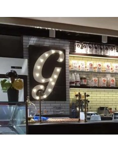 Aged iron metallic letters with vintage light bulbs 2