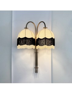 decorative wall light in aged brass with fringes 2