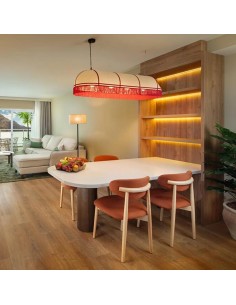 lampara colgante de tela ovalada con flecos en habitacion de hotel de lujo