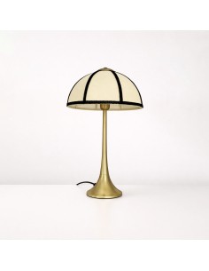 Talia table lamp with brass base, beige linen shade and black trim