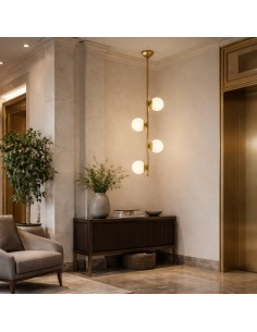 Vertical pendant lamp in brass with amber lampshades for luxury interior design projects 2