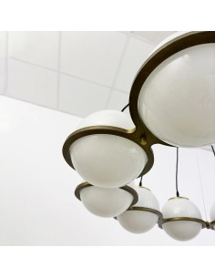 Ring pendant lamp in brass with opal glass spheres that provides elegant, even lighting. 2