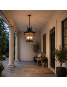 Black metal ceiling lantern with a traditional design, transparent glass panels and warm ambient lighting. 2