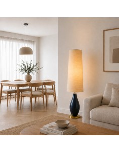 Floor lamp with a dark blue base and linen shade that brings warmth and elegance to the living room. 2