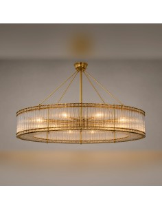 Diseño circular en dorado y cristal que combina elegancia, brillo y sofisticación.
